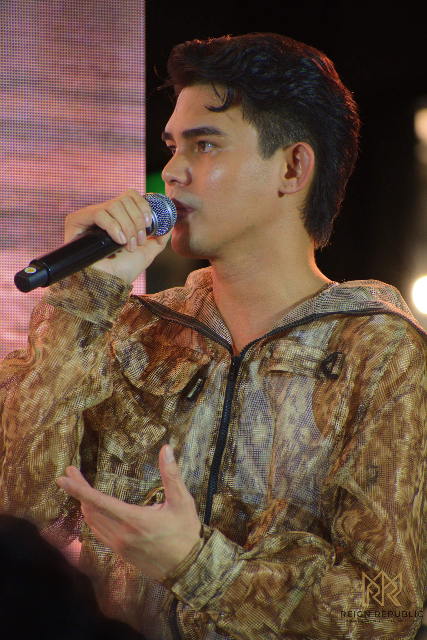 A brand ambassador speaking at the launch.